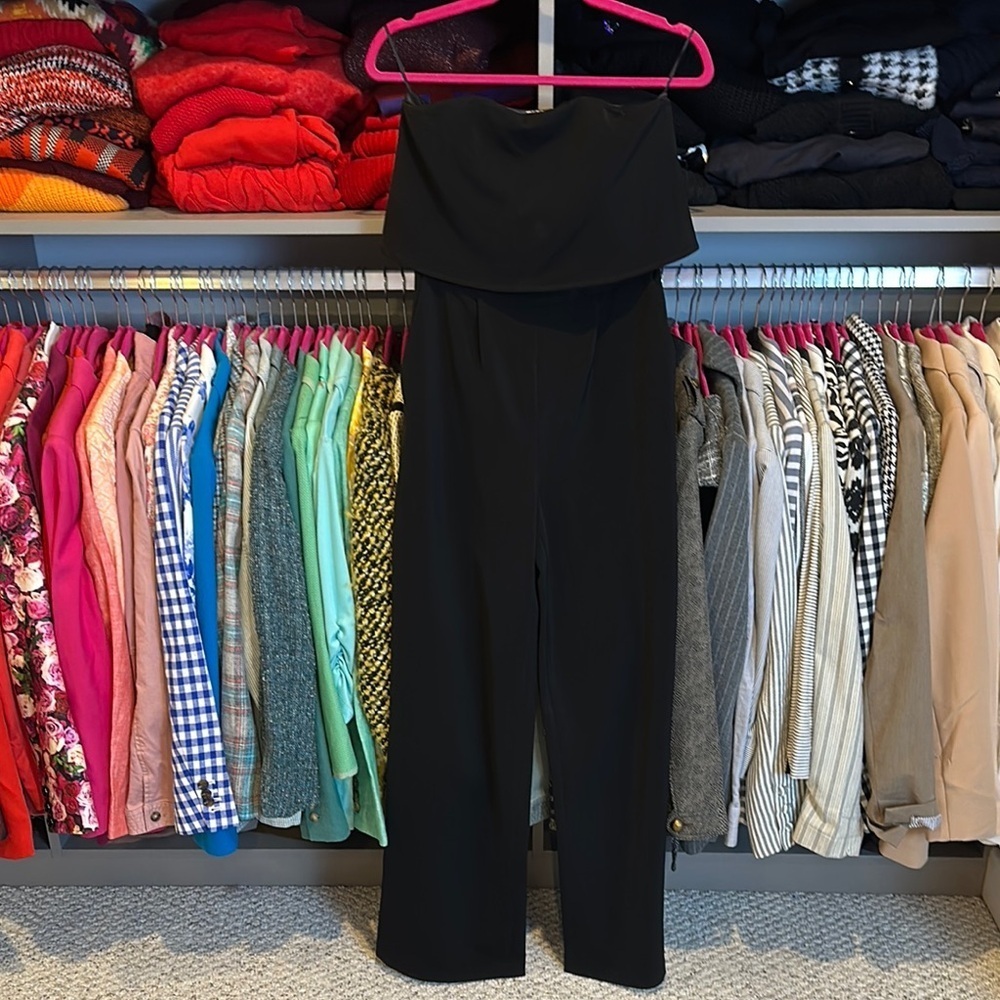 Express black sleeveless 2 pocket back zipper closure jumpsuit size 0